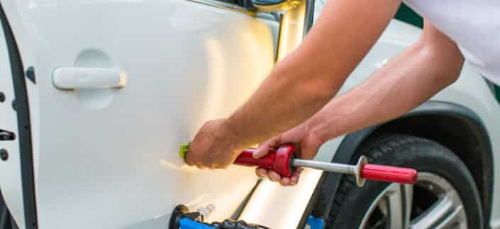 The Art Of Paintless Dent Removal: How To Restore Your Car's Beauty